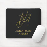 Modern Black Gold Monogram Mouse Pad<br><div class="desc">Keep your workspace stylish and functional with this Modern Black Gold Monogram Mouse Pad. The sleek design features a customisable monogram on a black background, and the non-slip rubber base ensures a secure grip on any surface. Perfect for both personal and professional use, this mouse pad is a great way...</div>