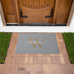 Modern black gold monogram script name doormat