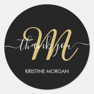 Modern black gold script monogram thank you classic round sticker