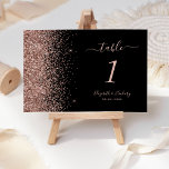 Modern Black Rose Gold Glitter Edge Wedding Table Number<br><div class="desc">The left-hand edge of this elegant modern wedding table number features a rose gold faux glitter design. The customisable text combines pale rose coloured handwriting,  copperplate and italic fonts on a black background.</div>