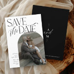 Modern Black Simple Arch Photo Elegant Wedding Save The Date<br><div class="desc">This elegant and simple black and white modern wedding save the date, featuring an arch engagement photo script typography and minimalist wording design on the front, and monogram with wedding website on the back side over a solid black background, is the perfect way to announce your big day! You may...</div>