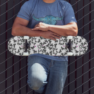 Modern black white and pink zebra skateboard