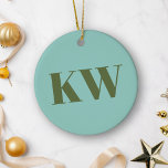 Modern Blue Green Monogram Initials Personalised  Ceramic Ornament<br><div class="desc">Add a touch of sophistication to your holiday decor with this personalised ceramic ornament, featuring bold monogram initials in a sleek blue and green colour palette. Perfect for celebrating the holidays in style, this ornament can be customised with your initials to create a truly unique and timeless keepsake. Whether you’re...</div>