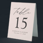 Modern Blush Wedding Table Number<br><div class="desc">Trendy, minimalist wedding table number tent signs featuring black modern lettering with "Table" in modern calligraphy script. The design features a blush background or a colour of your choice. The design repeats on the back. To order the table number tent signs: personalise with your names, wedding date, and table number....</div>