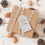 Modern Boho Beige Happiest Holidays To and From Gift Tags<br><div class="desc">Celebrate the joy of the season with these modern boho beige happiest holidays gift tags. The unique and chic editable script creates a touch of charm and individuality. Its simple, elegant black-and-beige design, featuring a classic bohemian arch frame, evokes a whimsical winter ambiance. The minimal and delicate festive font adds...</div>