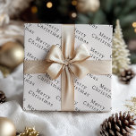 Modern Boho Customisable Text | Beige Christmas Wrapping Paper Sheet<br><div class="desc">Celebrate the holiday season with these modern boho customisable text | beige Christmas wrapping paper sheets. Its simple black and beige design embodies a classic and whimsical feel, perfect for the winter season. The minimal bohemian festive designer font adds creativity and charm, while the clean and basic neutral layout enhances...</div>