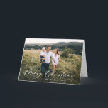 Modern botanicalr 1 photo Christmas elegant script Holiday Card<br><div class="desc">Modern minimal foliage classy muted green watercolor botanical script holiday Christmas card. Hand painted eucalyptus,  minimal foliage and modern rustic rattan wreath give this holiday card a luxurious high end feel. In classy greens,  browns,  blues and greys.</div>