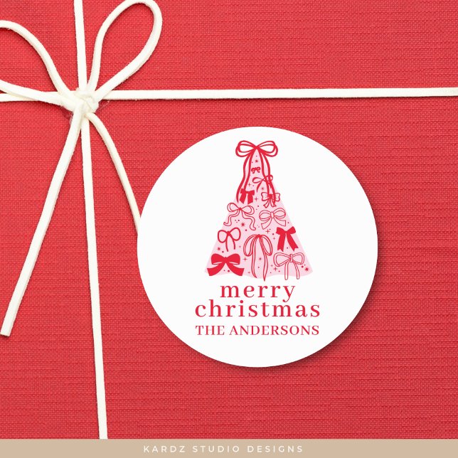 Modern Bow Pink Red Christmas Tree Classic Round Sticker (Round sticker shown in 1.5 inches, choose size, glossy or matte finish, and personalize it.)