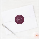 Modern Burgundy Leafy Crest Monogram Wedding Classic Round Sticker<br><div class="desc">A refined finishing touch for your wedding stationery, this elegant monogram seal sets the tone for a celebration of distinction. Featuring a delicate crest of botanical flourishes encircling your initials, it adds an air of sophistication to invitations, save-the-dates, and thank-you cards. The rich burgundy hue evokes timeless elegance, seamlessly complementing...</div>