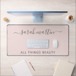 Modern Business Blush Pink Elegant Desk Mat<br><div class="desc">Elegant desk mat in blush pink featuring your business name with swashes in a grey handwritten script calligraphy along with your tagline.  This simple and feminine design is great for a makeup artist,  hair stylist,  lashes technician,  beauty / nail salon or any woman owned business.</div>