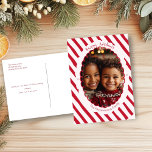 Modern Candy Cane Stripe Christmas Photo Postcard<br><div class="desc">This design is part of the Retro Candy Cane Christmas collection. With bold red-and-white diagonal stripes and vintage-inspired details, it brings a fun, nostalgic feel to the season. The scalloped frame and classic layout add a cosy touch of old-school charm. Click the personalise button to add your own details and...</div>