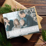 Modern Christmas Photo | Simple Clean White Holiday Card<br><div class="desc">Beautiful photograph holiday card with a simple, modern, minimalist “Merry Christmas” quote banner in fresh white text with a trendy cutout design on a semi-transparent overlay background. This versatile card can be personalized with your own photograph, family name and year to make a truly unique and bespoke card for the...</div>
