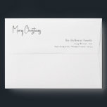 Modern Christmas Script Invitation Envelope<br><div class="desc">This modern Christmas script invitation envelope is perfect for your minimalist shabby chic boho black and white holiday greeting. The minimal whimsical handwritten calligraphy is delicate and rustic while staying classy and elegant. The design reflects a simple all-white winter day and evokes memories of a more simplistic life. You will...</div>
