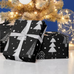 Modern Christmas Trees Black Grey Pattern Wrapping Paper<br><div class="desc">Modern Christmas holiday season giftwrap roll featuring a pattern of modern, abstract Christmas trees and forest trees in winter snow in black and silver grey colours. ASSISTANCE: For help with design modification or personalisation, transferring the design to another product or if you would like coordinating items, contact the designer BEFORE...</div>