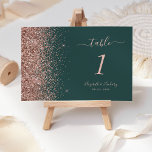 Modern Dark Green Rose Gold Glitter Wedding Table Number<br><div class="desc">The left-hand edge of this elegant modern wedding table number features a rose gold faux glitter design. The customisable text combines rose pink handwriting,  copperplate and italic fonts on a dark green background.</div>