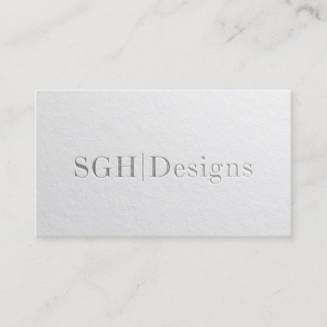 Modern Designer Minimal White Silver Embossed Text Business Card (Front)