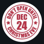 Modern Do NOT Open Until Christmas Eve Stamp Classic Round Sticker<br><div class="desc">Stylish and fun, these stickers are the perfect accessory to your holiday gift-giving needs. The design features a solid white background with a red, round stamp with the text "Don't Open Until Christmas Eve" and the date "Dec 24." Great for packages, letters, and any other gifts you need to seal...</div>
