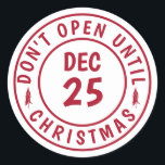 Modern Do NOT Open Until Christmas Stamp Classic Round Sticker<br><div class="desc">Stylish and fun, these stickers are the perfect accessory to your holiday gift-giving needs. The design features a solid white background with a red, round stamp with the text "Don't Open Until Christmas Eve" and the date "Dec 25." Great for packages, letters, and any other gifts you need to seal...</div>
