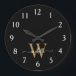 Modern Elegant Black Gold Monogram Name Script Large Clock<br><div class="desc">Girly Stylish Modern Elegant Black and Gold Monogram Initial Name Script Custom Personalised Large Clock. This design featuring a first name in a pretty hand lettered swash tail font calligraphy (or typography) with monogram initial in gold and white on black. Easy to customise it. Great stylish feminine housewarming gift, also...</div>