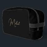 Modern Elegant Black Gold Monogram Travel Cosmetic Dopp Kit<br><div class="desc">Create your own custom, personalised, beautiful modern elegant faux gold script / typography monogram monogrammed, durable Polyester Poplin, sturdy polyester fabric mens womens kids solid plain black cosmetic makeup toiletry organiser golf beach accessory gym travel dopp kit bag pouch with a zippered closure, two interior mesh pockets - one zippered...</div>