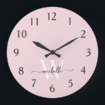 Modern Elegant Blush Pink Monogram Name Script Large Clock<br><div class="desc">Girly Stylish Modern Elegant Blush Pink Monogram Initial Name Script Custom Personalised Large Clock. This design featuring a first name in a pretty hand lettered swash tail font calligraphy (or typography) with monogram initial in white and black on blush pink colour background. Easy to customise it. Great stylish feminine housewarming...</div>