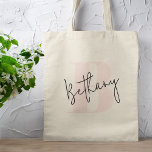 Modern Elegant Blush Pink Monogram Tote Bag<br><div class="desc">A handwritten monogram design in an elegant style in black informal casual script typography over a blush bold pink initial oversized letter. The text can easily be customised for a design as unique as you are!</div>