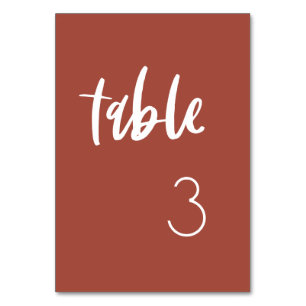 Modern elegant burnt brick wedding table number