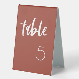 Modern elegant burnt brick wedding table number
