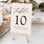 Modern Elegant Cream Wedding Table Number<br><div class="desc">Trendy, minimalist wedding table number cards featuring black modern lettering with "Table" in modern calligraphy script. The design features a creamy beige background or a color of your choice. The design repeats on the back. To order the table cards: add your name, wedding date, and table number. Add each number...</div>