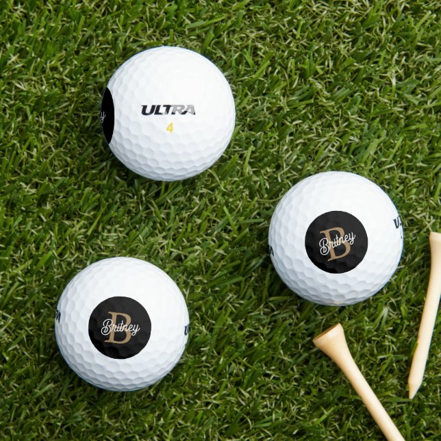 Modern Elegant Monogram Name Black Gold Script Golf Balls (Insitu Grass)