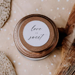 Modern Elegant Script Love Is Sweet Favours Classic Round Sticker<br><div class="desc">This gorgeous print will wow your future guests!</div>