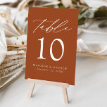 Modern Elegant Terracotta Wedding Table Number<br><div class="desc">Trendy, minimalist wedding table number cards featuring white modern lettering with "Table" in a modern calligraphy script. The design features a terracotta background or color of your choice. The design repeats on the back. To order the table cards: add your name, wedding date, and table number. Add each number to...</div>
