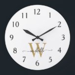 Modern Elegant White Gold Monogram Name Script Large Clock<br><div class="desc">Girly Stylish Modern Elegant White and Gold Monogram Initial Name Script Custom Personalised Large Clock. This design featuring a first name in a pretty hand lettered swash tail font calligraphy (or typography) with monogram initial in gold and black colour on white colour background. Easy to customise it. Great stylish feminine...</div>
