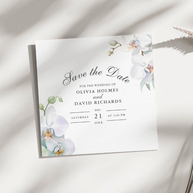 Modern Elegant White Orchid Save the Date Card (Modern Elegant White Orchid Save the Date Card on a sunny white table.)