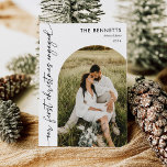 Modern First Christmas Engaged Boho Arch Photo Holiday Card<br><div class="desc">Celebrate your first Christmas together as an engaged couple with a modern holiday card featuring a beautiful arch design. This card showcases your favourite photo in an elegant boho arch frame, perfectly capturing the warmth and excitement of the season. The soft, earthy tones and stylish typography add a contemporary touch,...</div>