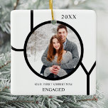 Modern First Christmas Engaged Photo Ceramic Ornam Ceramic Ornament<br><div class="desc">This modern First Christmas Engaged Photo Ornament is decorated with the word JOY in black on a white background.
Easily customisable with your photo and name.</div>