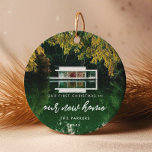 Modern First Christmas in our new home Photo Ceramic Ornament<br><div class="desc">Our first Christmas in our new home: a trendy script and a simple design for this photo ornament gift. To customise with your favourite picture. You can also easily change the colour of the font to your liking. A perfect housewarming gift or family keepsake to celebrate your First Christmas in...</div>