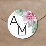 Modern Floral Tropical Wedding Classic Round Sticker<br><div class="desc">Modern Watercolor Floral Tropical Wedding Monogram Classic Round Sticker. A tropical design that embraces the tranquil beauty of nature mixed with a playful edge that is sure to help you have fun. A blend of calming green tropical leaves, and soothing purple-pink orchid flowers with other various other green foliage. Enhanced...</div>