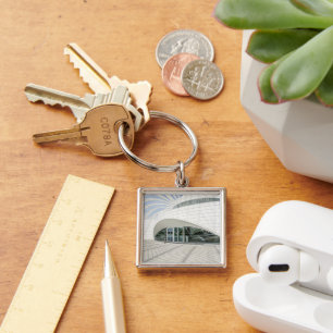 Modern futuristic white building key ring
