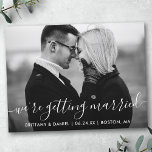 Modern Getting Married Save The Date BW Photo Postcard<br><div class="desc">Modern Trendy Calligraphy Script Couple Photo Save The Date We're Getting Married Engagement Announcement Postcard - Black and White Photo</div>