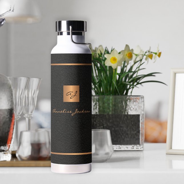 Modern gold black monogram and name personalised water bottle (Creator Uploaded)