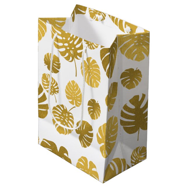 Modern Gold Monstera Tropical Leaves Pattern Medium Gift Bag (Front Angled)