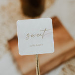 Modern Gold Script Sweet Wedding Favour Square Sticker<br><div class="desc">These modern gold script sweet wedding favour stickers are perfect for a minimalist wedding. The simple yellow gold colour design features unique industrial lettering typography with modern boho style. Customisable in any colour. Keep the design minimal and elegant, as is, or personalise it by adding your own graphics and artwork....</div>