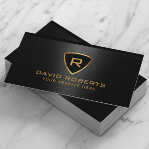 Modern Gold Shield Monogram Logo Black Metallic Business Card