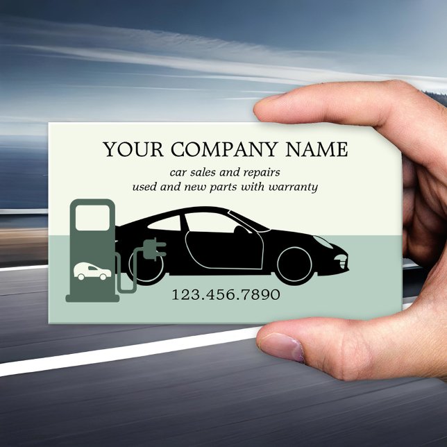 Modern Green Car Sales Repairs Business Card (Garage business card with an image of a car on green with charging station for an electric vehicle)
