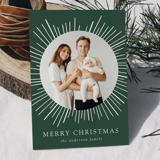 Modern Green Sunburst Merry Christmas 2 Photo Holiday Card (Creator Uploaded)