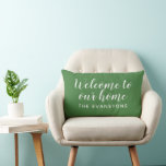 Modern Green Welcome Home Custom Last Name Lumbar Cushion<br><div class="desc">Modern leafy foliage green and white "Welcome to Our Home" lumbar pillow features stylish script text with custom sans serif monogram text that can be personalised with your family's last name. Indoor and outdoor pillow fabrics are available.</div>