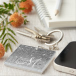 Modern Grey Glitter Sparkles Personalised Name Key Ring<br><div class="desc">Introducing the exquisite Modern Grey Glitter Sparkles with Personalised Name product, a stunning combination of contemporary design and personalised elegance. This product features a captivating backdrop in a modern shade of grey, exuding sophistication and style. The subdued yet chic colour sets the stage for the mesmerising sparkle of glitter, which...</div>