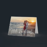 Modern Mele Kalikimaka Beach Photo Christmas Holiday Card<br><div class="desc">Send out holiday cheer with this modern folded Christmas card featuring a simple design with the Hawaiian greeting "Mele Kalikimaka" in an elegant thin white script, along with your names and year over your favourite photo. Add your personal message to the inside or delete the text if you want to...</div>