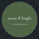 Modern Merry & Bright Green Christmas Holiday Classic Round Sticker<br><div class="desc">Modern Holiday stickers featuring the words "Merry and Bright". Ideal for the holiday season for Christmas or New Year's. Personalise the custom text above. You can also change the background colour. You can find additional coordinating items in our "Modern Colourful Merry & Bright Holiday" collection.</div>